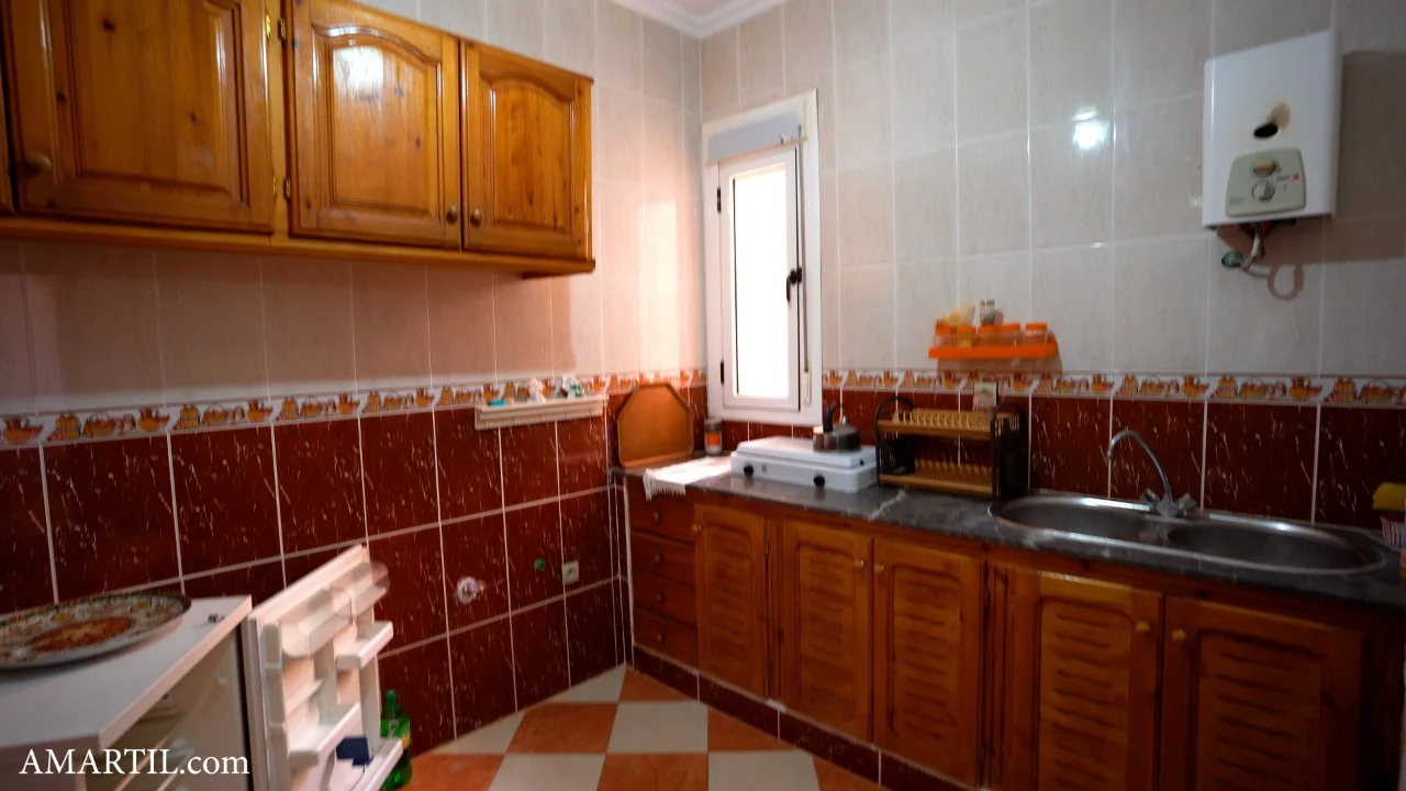 Appartement a vendre equipe a centre de Oued Laou 2 chambres salon grand cuisine