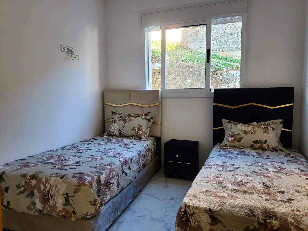 Appartement élégant à louer à la journée au rez-de-chaussée,  de deux chambres 